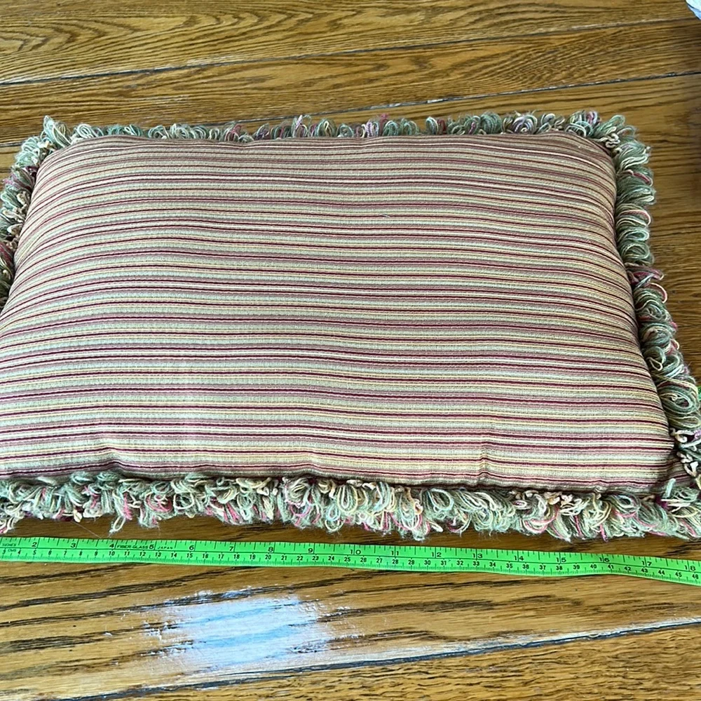 Striped gold/wine accent pillow with fringe.  Size is 14” x 18”